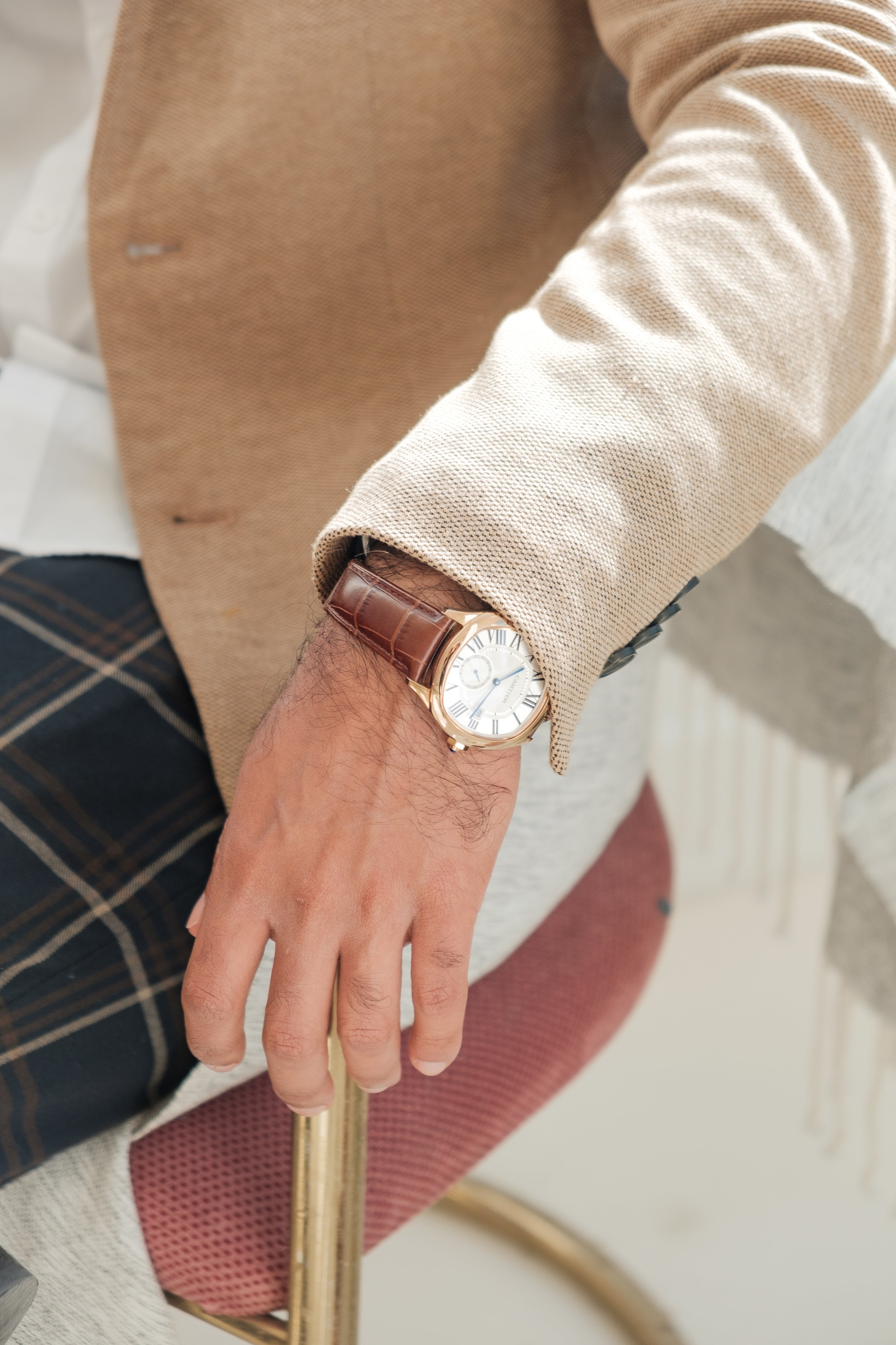 close-up-of-classic-gold-and-leather-watch.jpg